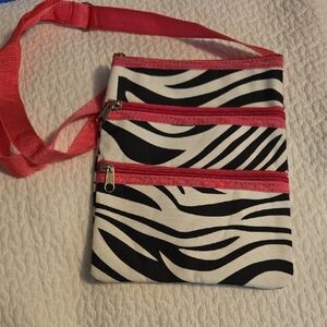 Stylish Zebra Print Crossbody Bag with Pink Accents